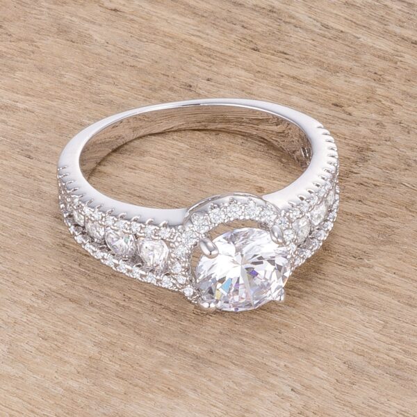 Classic solitaire halo ring, rhodium plated over lead free alloy (brass), with round cubic zirconia.