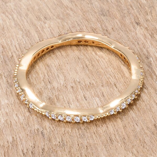 Gold tone over lead free alloy (brass) eternity ring with round 1.3mm cubic zirconia in a micro pave setting.