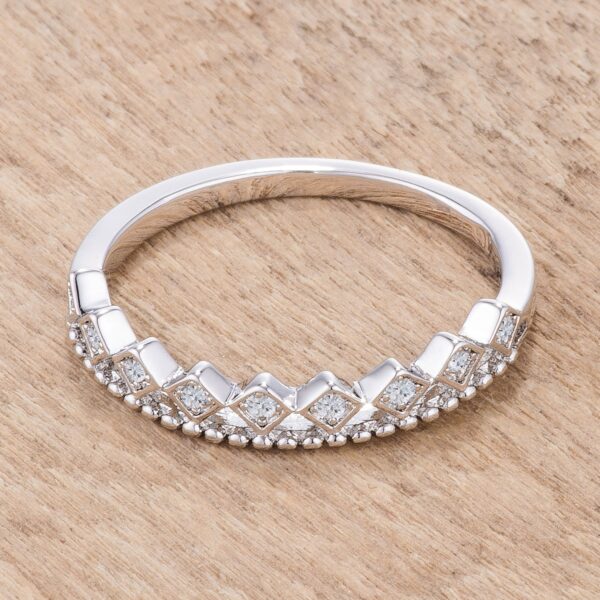Mini crown stackable band in silver tone over lead free alloy (brass), with channel-set princess-cut cubic zirconia.