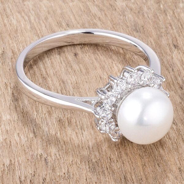 Side angle of the silvertone plated halo ring showing the band and pearl setting