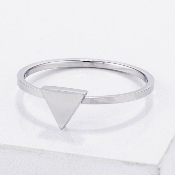Close-up angled view of the triangle stackable ring showing the band profile