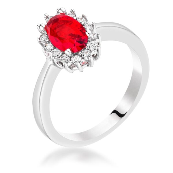 Oval-cut ruby-colored cubic zirconia ring in a prong setting with a silver tone over brass finish.