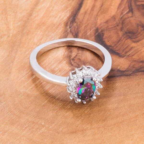 Classic ring with oval-cut, multi color cubic zirconia, a prong setting, and a silver tone over brass finish.