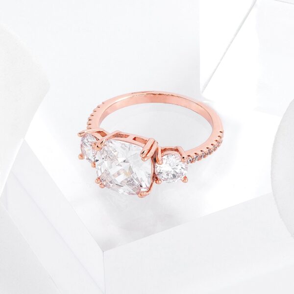 Prong-set cushion-cut cubic zirconia measuring 9mm x 9mm and round-cut cubic zirconia measuring 5mm