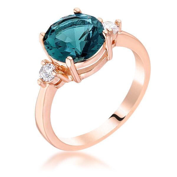 Rose gold tone over lead free alloy (brass) ring with round blue green cubic zirconia in a three-stone engagement design
