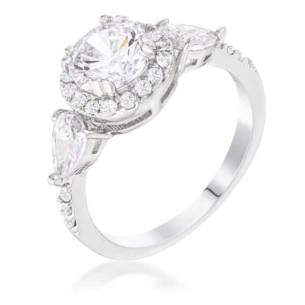 Silver tone over brass ring with 3 clear cubic zirconia stones in a round halo pear engagement-ring design.
