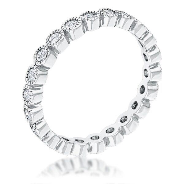 Silver tone over brass eternity ring with clear 2.25mm cubic zirconia in a dotted round bezel design.