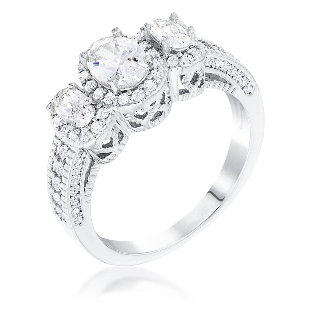 3-stone clear oval cut cubic zirconia halo ring in silver tone over brass