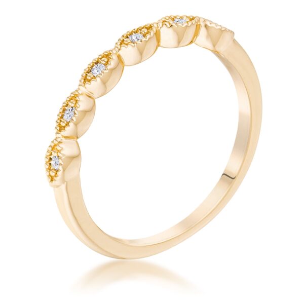 Gold tone over brass delicate stackable ring with a sextus marquise design and clear cubic zirconia.