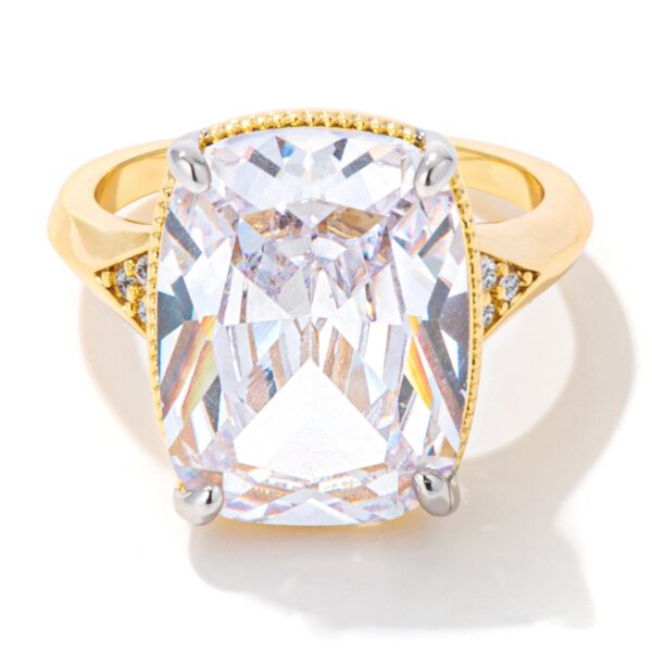Gold tone engagement ring with an elongated cushion cut detail.