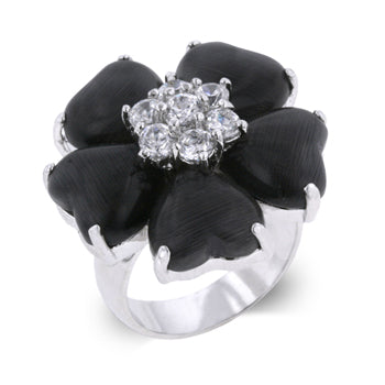 Clover-shaped ring with heart-shaped petals and a clear center stone in a white-toned finish