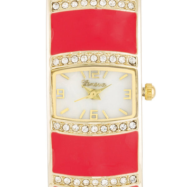Side angle of the pink cuff watch showing the open band and crystal-set face