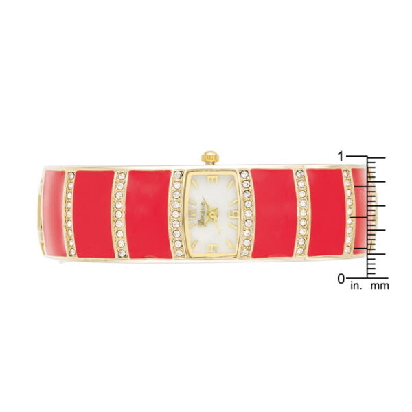 Close-up of the crystal-set watch face on the pink gold-tone cuff watch