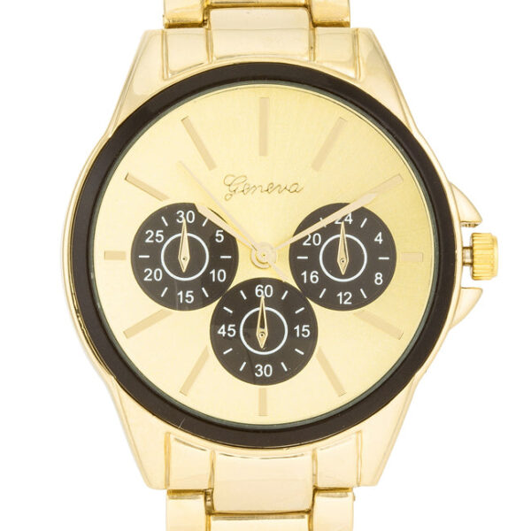 Close-up of the watch dial and dark bezel showing chronograph-style detailing