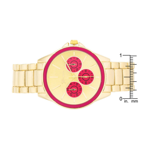 Side angle of the wristwatch showing the round face and pink bezel from a different perspective