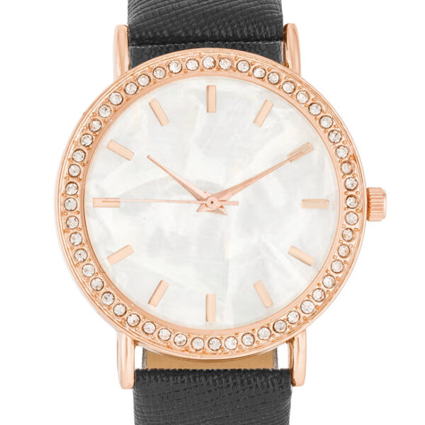 Close-up of the watch face showing the shell pearl dial and surrounding crystals
