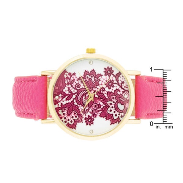 Close-up of the floral print dial and crystal accents on the watch face
