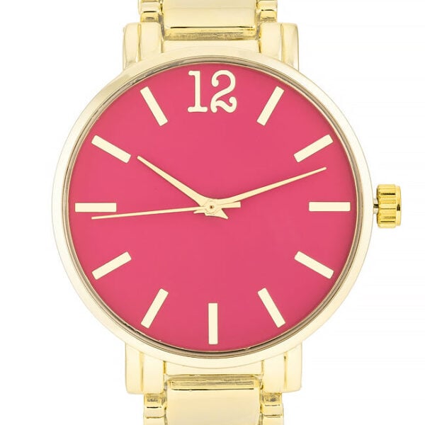 Close-up angle of the pink watch dial and gold-toned metal case