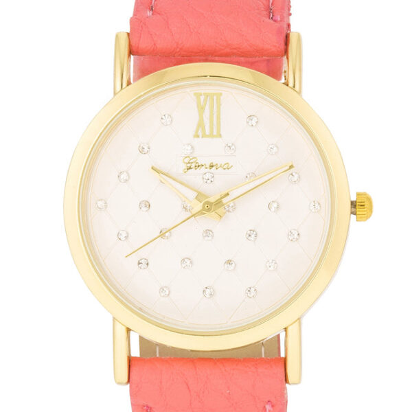 Close view of the watch dial and coral stone edging