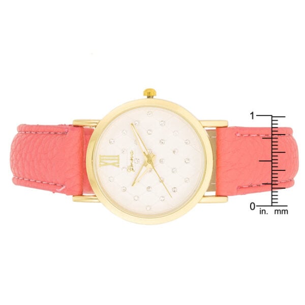 The watch strap shown at an angle against the gold-finished case