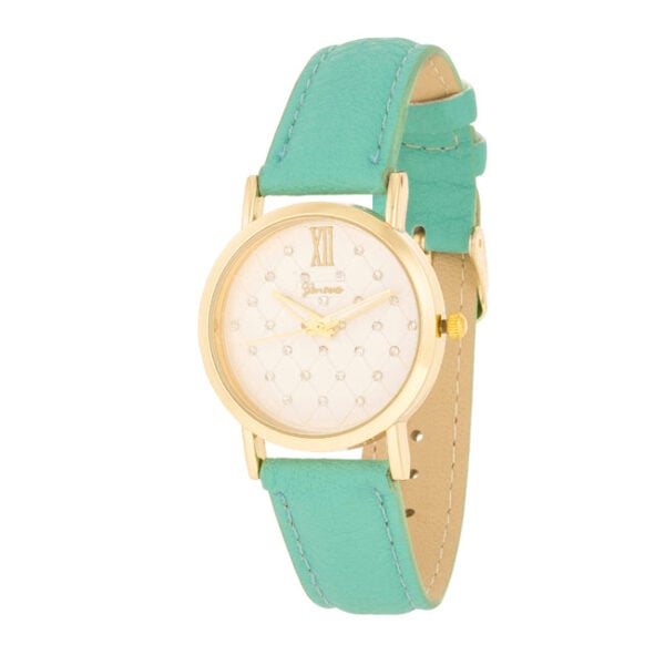 The watch shown face-up, displaying the gold tone case and dial with accent stones