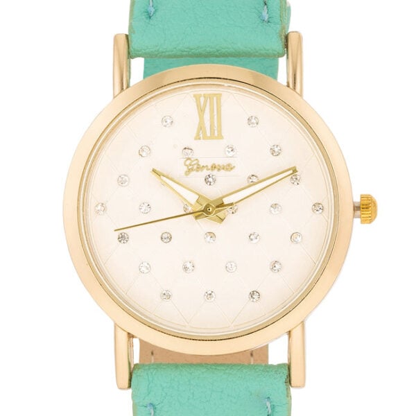 The watch angled to show the mint leather strap texture and case side