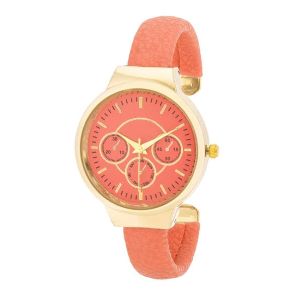 Cuff watch with goldtone plated case, leather band, and purple stone accent shown face-up