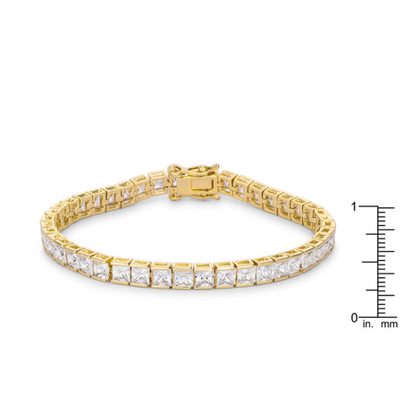 Close-up of the channel setting showing individual princess cut stones and the goldtone plated metal