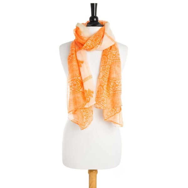 Orange scarf draped in loose folds showing how the fabric hangs