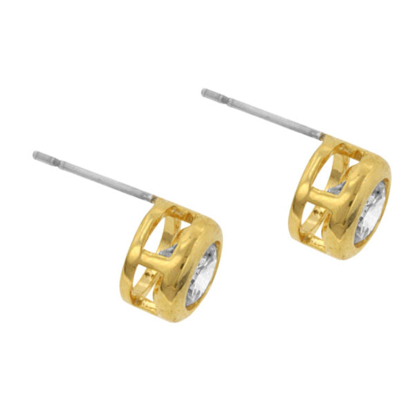 Close-up of a single goldtone bezel stud earring showing the round cubic zirconia stone and metal rim