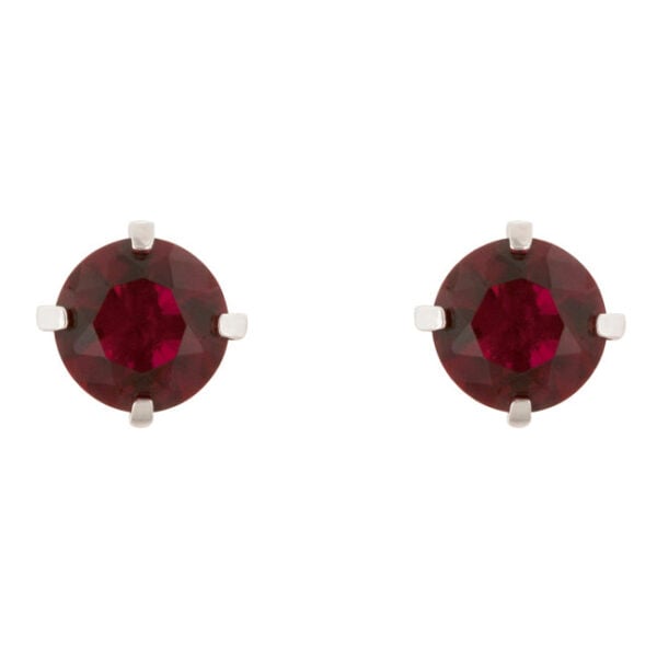 Pair of round ruby-colored cubic zirconia stud earrings with rhodium plated prong settings