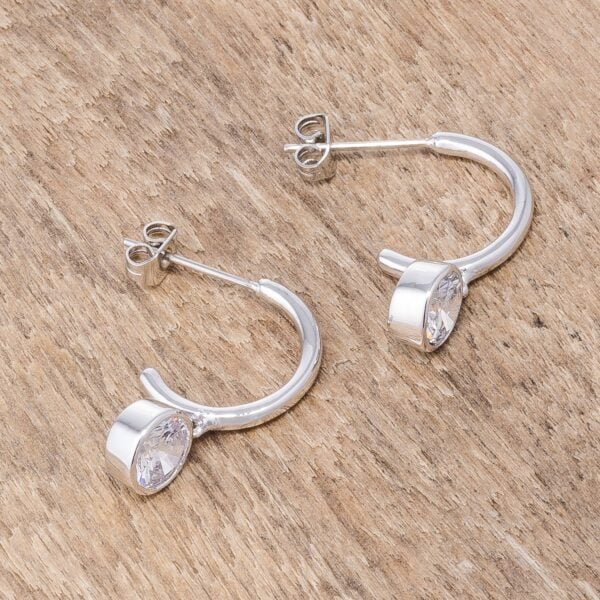 Drop hooplet earrings displayed at an angle showing the hoop shape and post backing