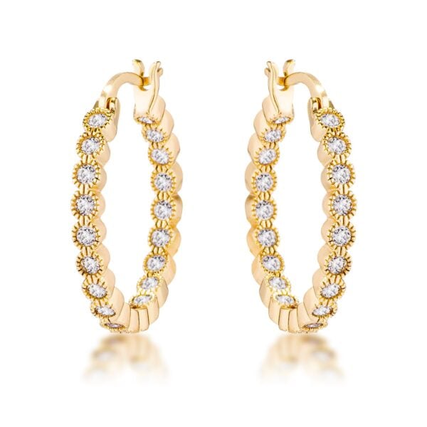 Goldtone plated hoop earring with a dotted bezel of clear round cubic zirconia stones