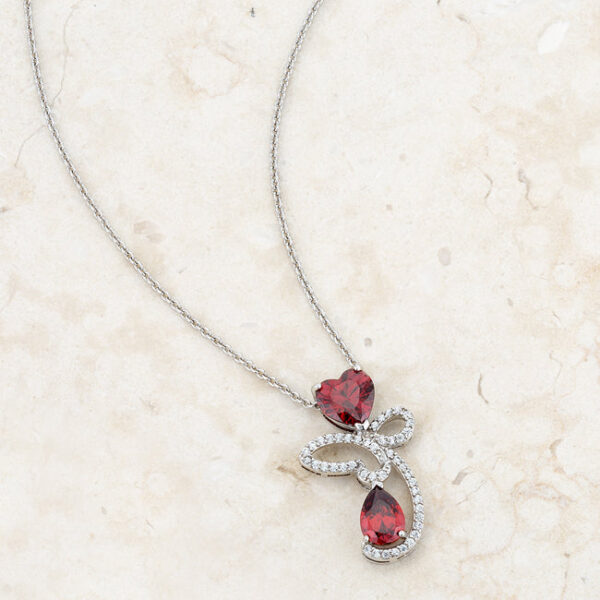 Contemporary abstract heart drop pendant in rhodium plated over lead free alloy (brass).