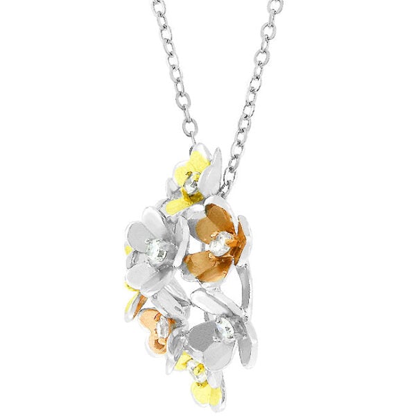 Close-up of the pendant's flower cluster showing prong-set cubic zirconia stones