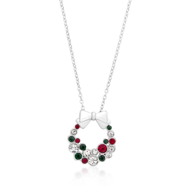 The pendant in rhodium plated over lead free alloy (brass), with round bezel-set crystals.