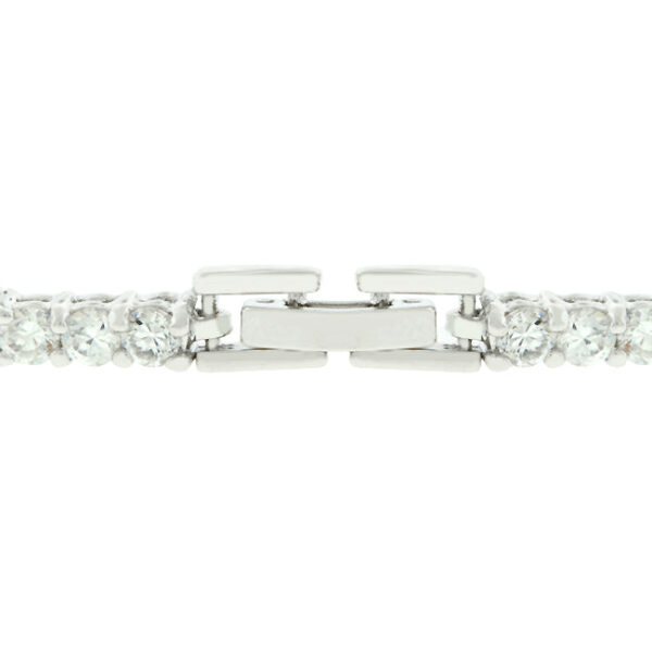 Round cubic zirconia in prong settings on a rhodium plated over lead free alloy (brass) triplet bracelet