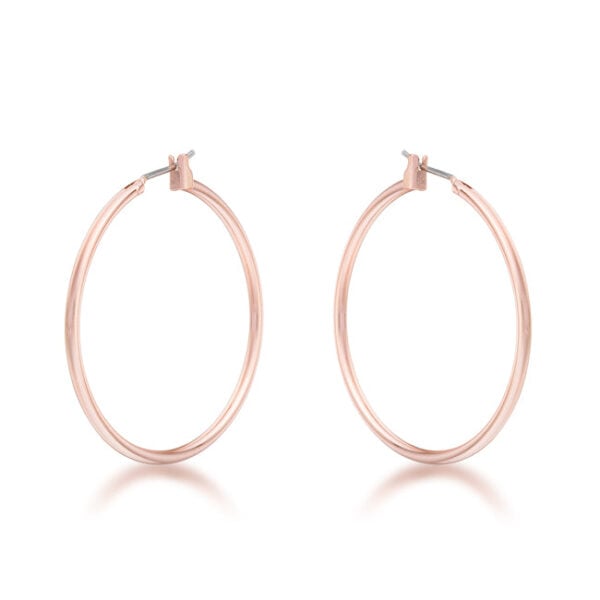 A pair of plain round rose gold hoop earrings against a plain background