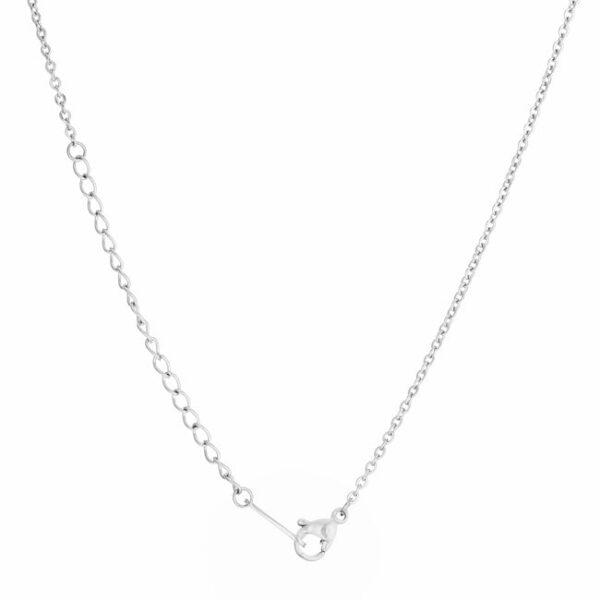 Close-up of the arrow pendant showing the rhodium plated finish and its reflective surface