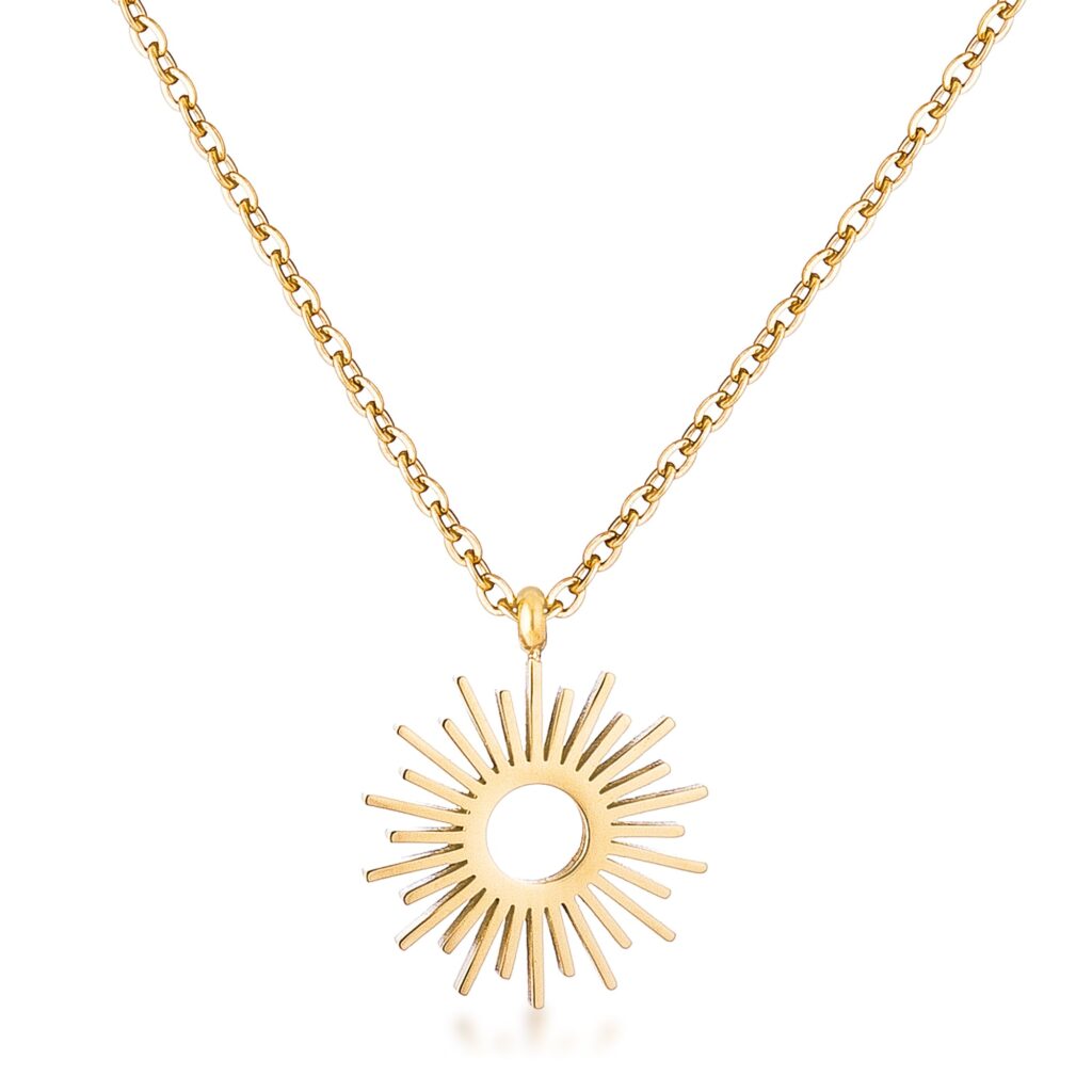 Gold tone sunburst pendant necklace laid flat, showing the radiating rays of the pendant shape