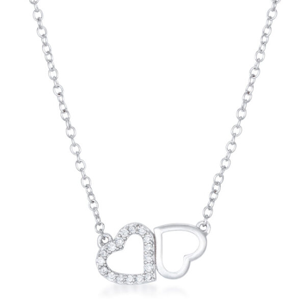 Two joined heart pendants in rhodium plating, one set with white cubic zirconia stones, on a necklace chain