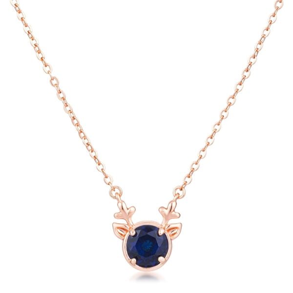 Rose gold plated reindeer pendant showing the blue cubic zirconia side on a chain