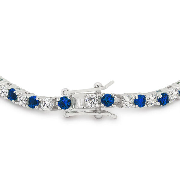Lock clasp on a 7 inch tennis bracelet of rhodium plated over lead free alloy (brass).