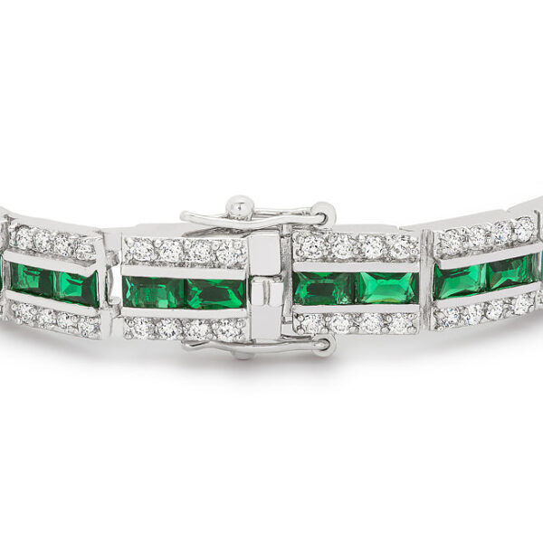 Prong-set emerald-colored cubic zirconia tennis bracelet with and round stones and 5.1 ct total stone weight.