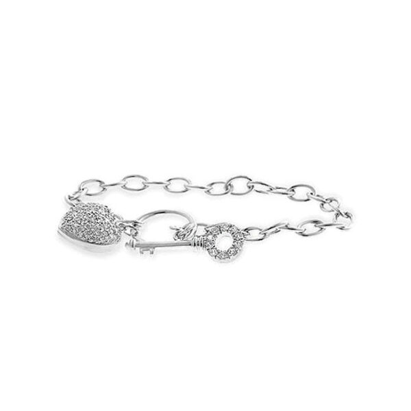 Heart and key charm bracelet laid flat, showing pave-set cubic zirconia stones and a toggle clasp