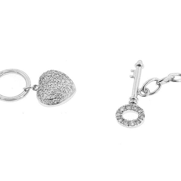 Close-up of the pave-set cubic zirconia heart charm on the bracelet