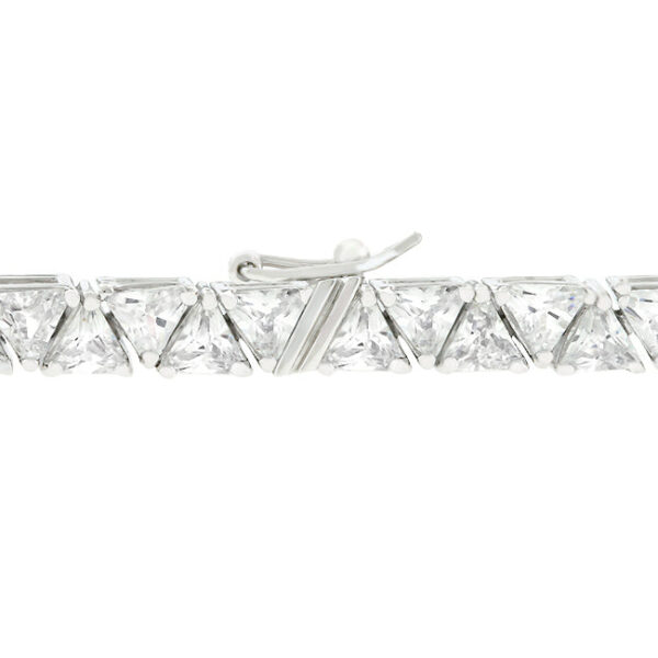 Trillion-cut cubic zirconia in prong settings on a rhodium plated over lead free alloy (brass) link bracelet.
