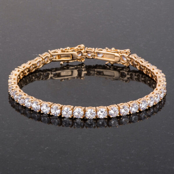 Close-up of the lock clasp and gold plated links on the tennis bracelet
