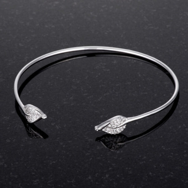 Rhodium plated cubic zirconia bracelet displayed to show its overall finish and stone placement