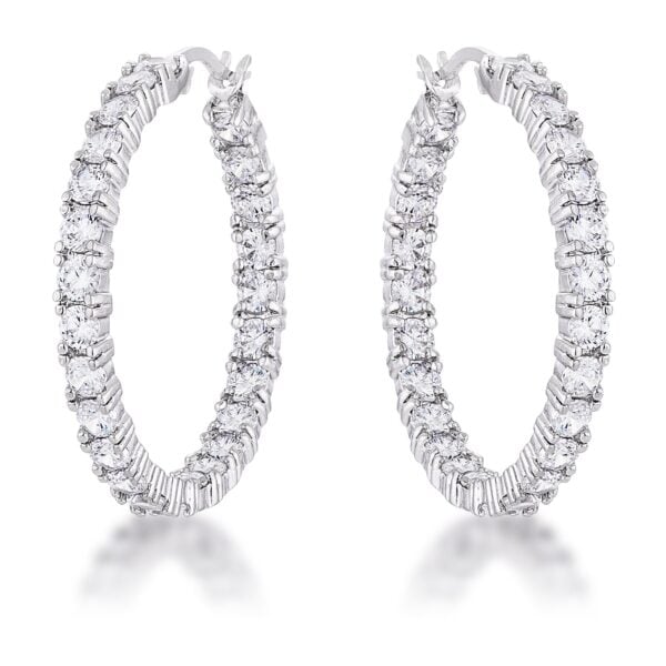 The earrings with round cubic zirconia in prong settings and rhodium plated over lead free alloy (brass).